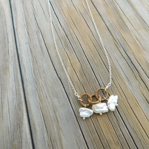 Pearl and Brass Charm Necklace